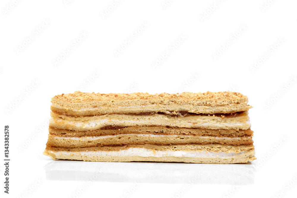 Slice of honey cake isolated on white background. Slice of honey cake isolated on white background.