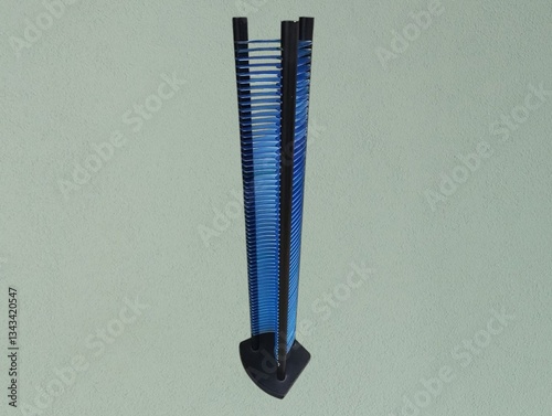 The light green background in the picture is a CD holder. The frame material is made of good quality plastic, strong and durable, black color. The CD holder slot is made of blue plastic.