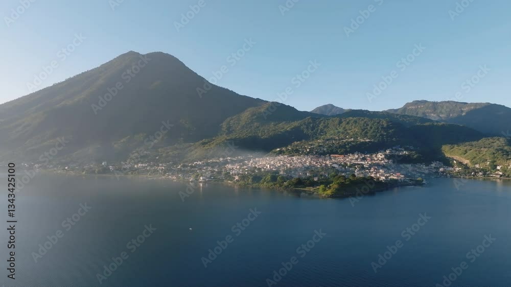 Beautiful landscape of San Pedro La Laguna village on Lake Atitlan at sunrise, Drone shot, Panoramic view Beautiful landscape of San Pedro La Laguna village on Lake Atitlan at sunrise, Drone shot, Panoramic view