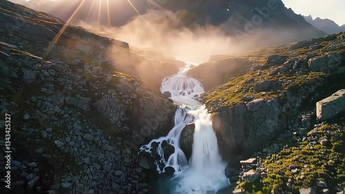 A stunning waterfall cascading down rocky cliffs, surrounded by lush greenery.