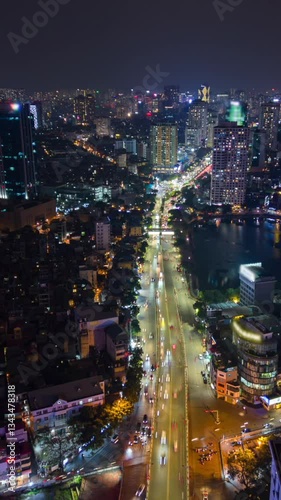 Wallpaper Mural Aerial timelapse of traffic in the business district and the illuminated Hanoi city skyline at night, Vietnam Torontodigital.ca