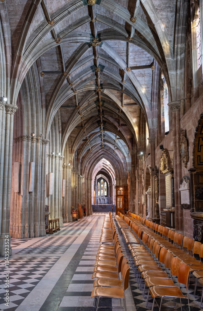 Fototapeta premium Worcester Cathedral, northern side Aisle, with empty seating arranged,Worcester,England,UK.