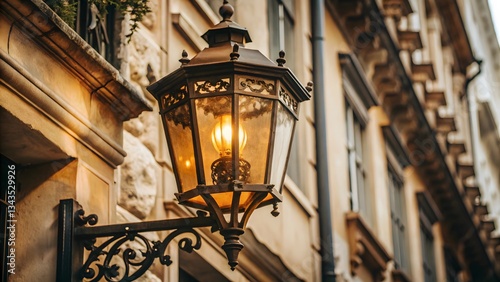Ornate Wall-Mounted Gas Lamp on Old Building Facade