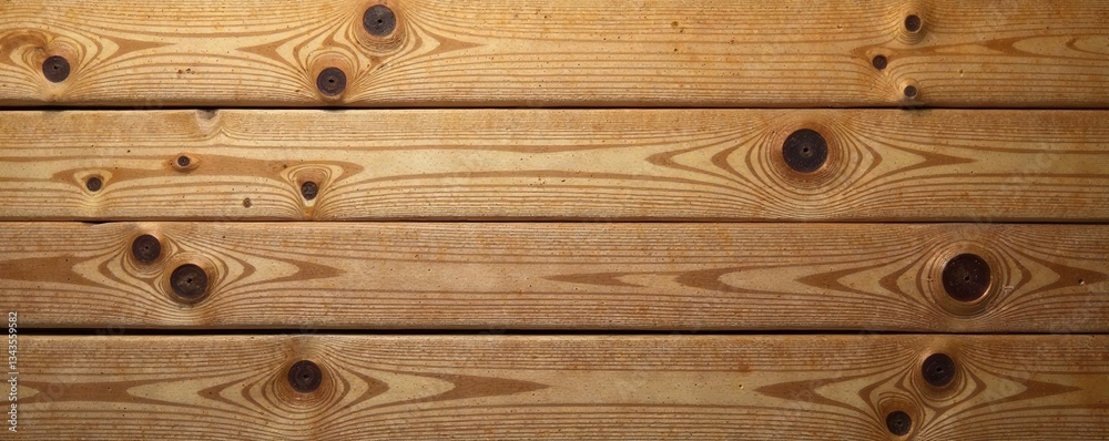 Naklejka premium Close-up shot of a single wooden board plank with visible knots and imperfections , natural, woodgrain