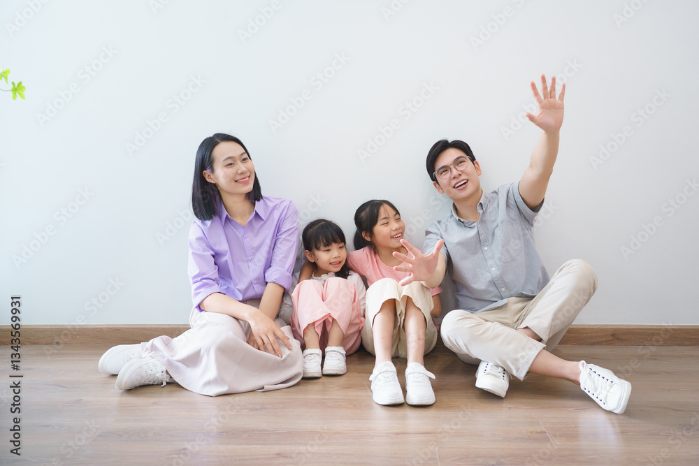 Family enjoying quality time together indoors in a modern home setting with smiles and joyful expressions Family enjoying quality time together indoors in a modern home setting with smiles and joyful expressions