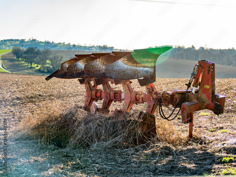 Obraz premium Pflug im Feld
