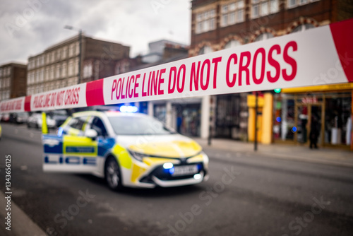 Police tape at the scene of a serious crime in west London- UK