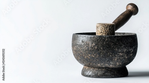 Traditional Indonesian spice grinder called Cobek and Munthu isolated on white background.Copy space for text.Spice grinder from natural stone in black.Kitchen tools concept.graphic design or banner