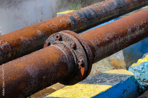 Old rusty iron pipe joints. Geothermal gas distribution pipes. Industrial concept. For graphic design, 3D design and banner background