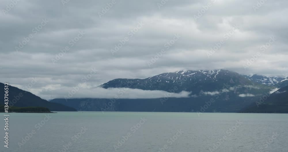 Juneau, Alaska. Sailing down the Gastineau Channel on a cloudy and rainy day. Juneau, Alaska. Sailing down the Gastineau Channel on a cloudy and rainy day.