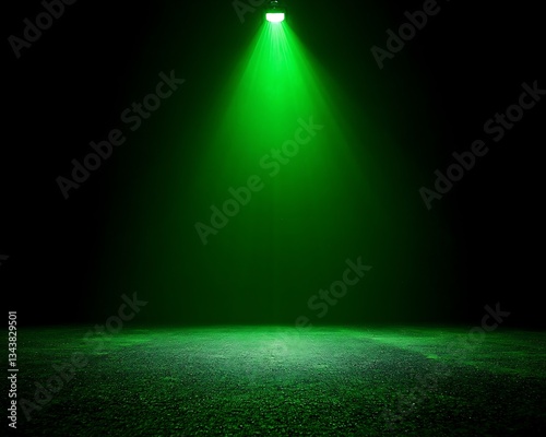 A Single Green Light Shines Down Onto A Textured Surface