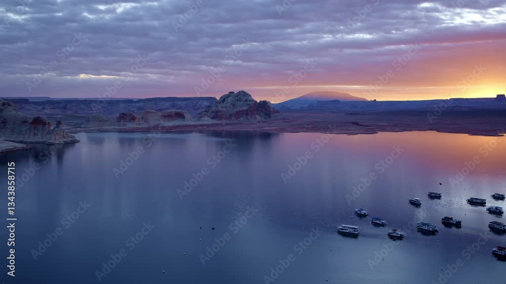 A drone glides effortlessly around Glen Canyon’s striking rock formations, capturing the beauty of erosion in motion. A drone glides effortlessly around Glen Canyon’s striking rock formations, capturing the beauty of erosion in motion.