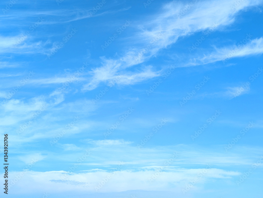 Wispy high-altitude delicate feathery white clouds in the sky Wispy high-altitude delicate feathery white clouds in the sky