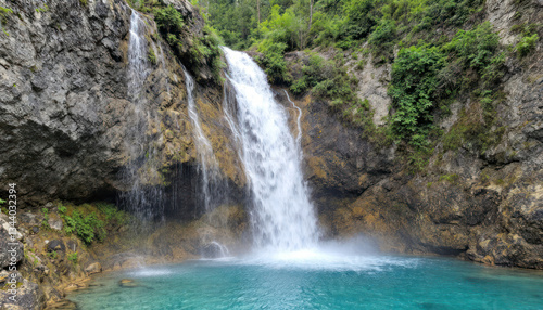 Majestic Waterfall Cascading into a Turquoise Pool