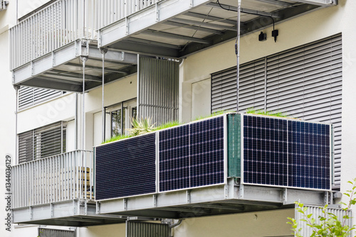 Balcony Solar Panel of Modern Apartment Building. Balcony Solar Power Plant. Photovoltaic Panels on Balcony Railing. 