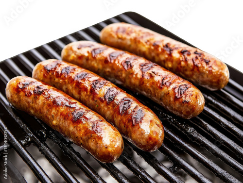 Juicy sausages grilling on a barbecue for summer cookout on a transparent background, cut out