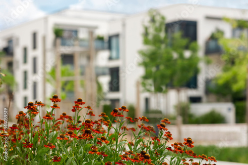 Modern Residential Buildings with Landscape Flowers on Apartment Building Background in Germany Munich.