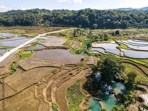 Southwest Sumba, East Nusa Tenggara , Indonesia – 05 . 29. 2024 – The beauty of Wee Kacura Waterfall surrounded by a thousand hectares of rice fields