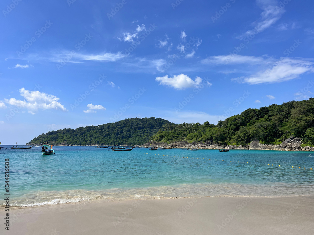 Fototapeta premium Beautiful Tropical Beach with Longtail Boats on Turquoise Waters in Phuket, Thailand