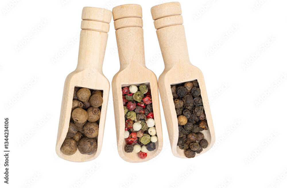 different spices in a wooden spoon