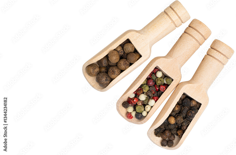 different spices in a wooden spoon