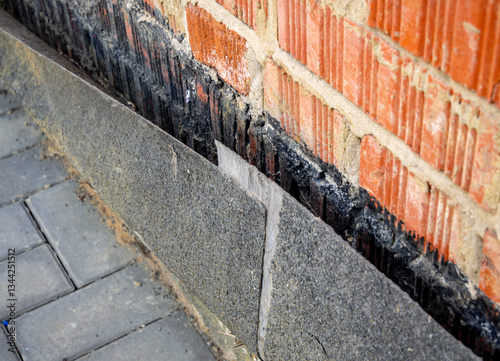 Poorly executed waterproofing of the building foundation