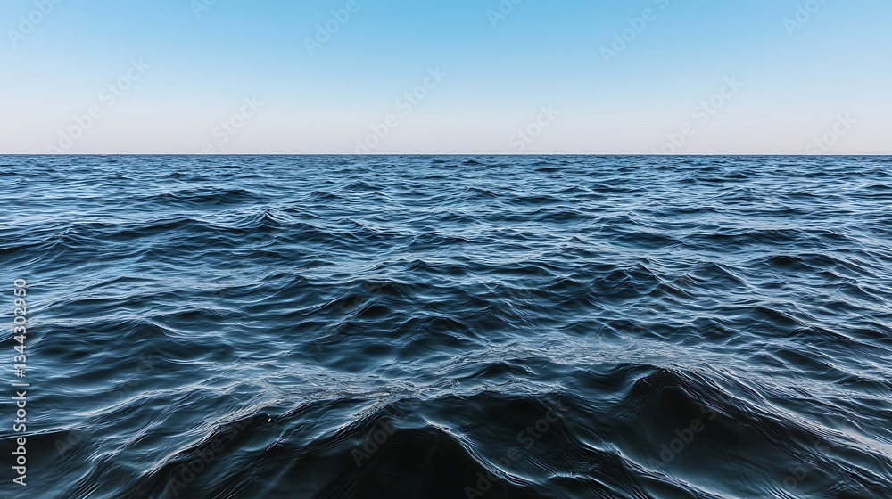 Fototapeta premium Calm Ocean Waves Under Clear Blue Sky with Horizon View and Gentle Ripples for Nature Lovers
