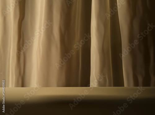Empty table, floor for product photography, background is cream colored curtain.