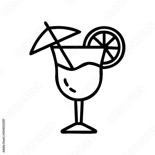 Refreshing cocktail served in a tall glass with a slice of lemon and a small umbrella on a sunny day at the beach