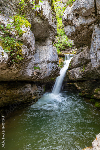 Waterfalls at tourist trail   Cascate del Boite . Dolomites. Italy