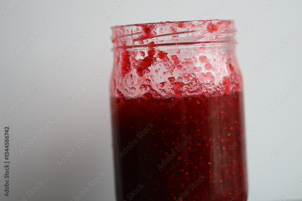 custom made wallpaper toronto digitalA close-up shot of a jar of jam on a table, suitable for use in food-related contexts.