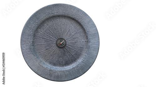 Obraz na płótnie Compass centered on a textured circular surface, symbolizing direction, exploration, and the pursuit of adventure w salonie