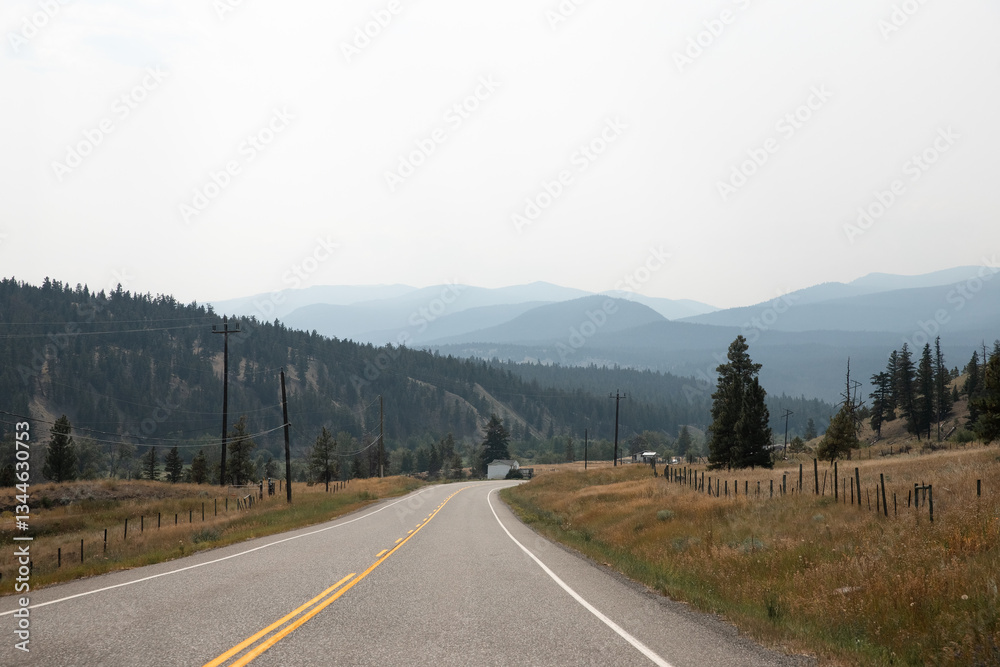 Naklejka premium Highway in the mountains, Canada. The concept of travel and adventure. 