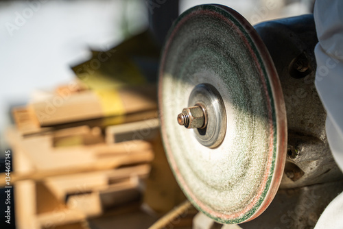 Sharpening and polishing machine in the workshop close-up photo