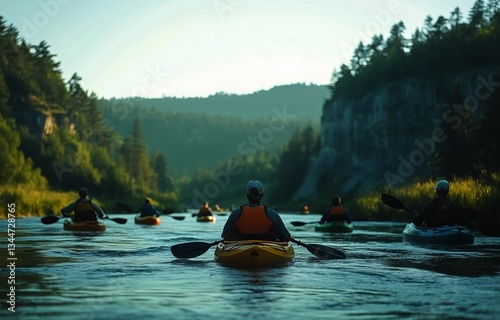 Kayaking Adventure in a Serene River Surrounded by Trees and Cliffs During Su...