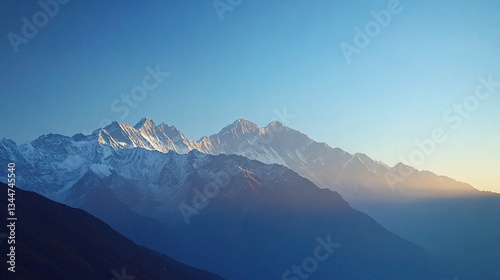 Morning Light on Snowy Peaks of Lhotse at Sunrise in Clear Sky