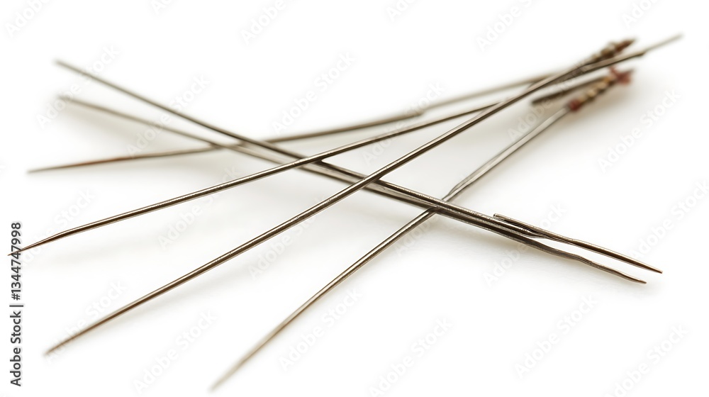 Assortment of Sharp Needles on White Background. Assortment of Sharp Needles on White Background.