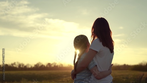 mother daughter happy family, woman kid happy family hugging, Mother Daughter Embracing Sunset, Serene Evening Countryside, Warm Hug Nature Glow, Family Love Under Twilight Sky, Peaceful, Moment
