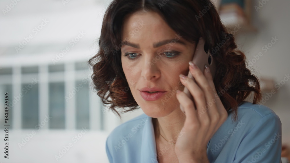 Serious office worker calling smartphone call at company office closeup worried Serious office worker calling smartphone call at company office closeup worried