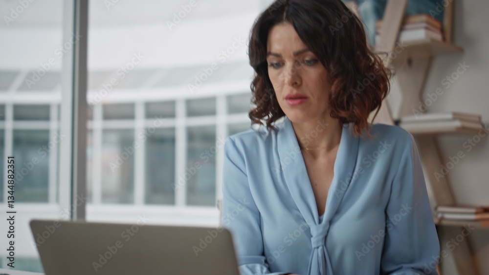 Office worker hand writing notes in notebook at workplace closeup. Woman stress Office worker hand writing notes in notebook at workplace closeup. Woman stress