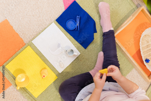 Montessori sorting activity with colorful objects