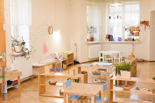 Montessori classroom with wooden furniture