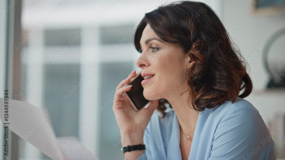 Dissatisfied ceo ending call sitting office with documents closeup. Woman boss Dissatisfied ceo ending call sitting office with documents closeup. Woman boss