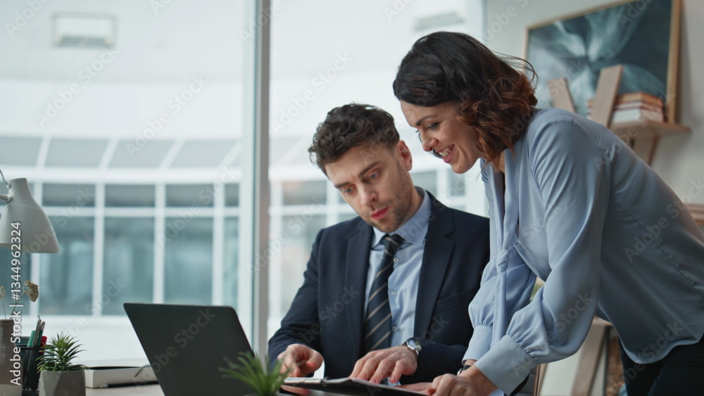 Two coworkers giving five rejoicing successful deal in office smiling closeup. Two coworkers giving five rejoicing successful deal in office smiling closeup.