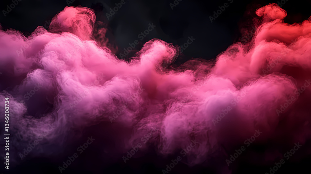 Colorful smoke in pink and red against black background