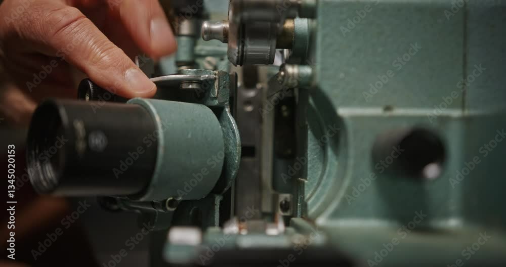 An InDepth CloseUp of the Maintenance and Repair Process of a Film Projector Unit An InDepth CloseUp of the Maintenance and Repair Process of a Film Projector Unit