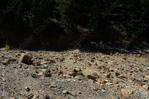 Fényképezés Rocks in a dried-up riverbed