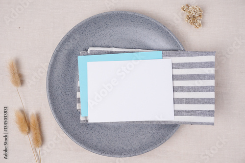 blank card on grey plate background