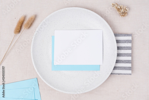 blank note paper on white plate