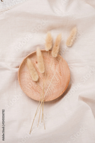 Wooden bowl and dry flower,